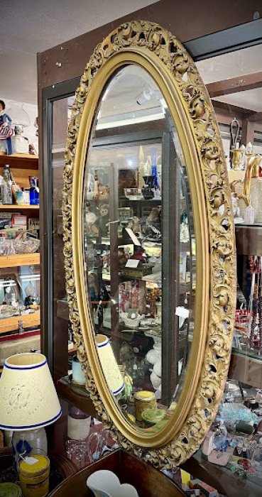 Oval beveled mirror, framed