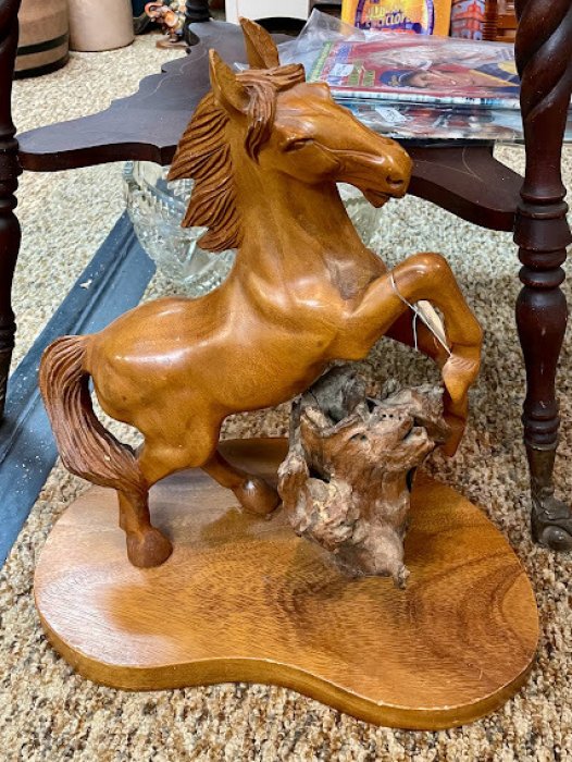 Carved rearing horse
